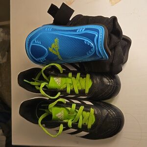 Kids soccer cleats and shin guards size 12k